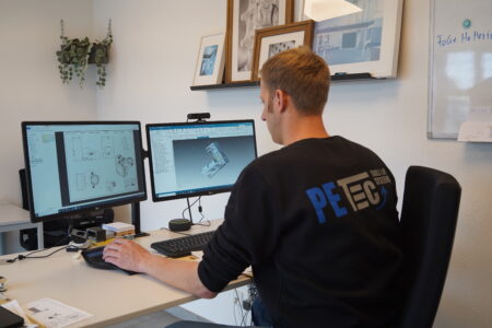 Konstruktion-Höhenverstellung-PETec-Hersteller-Arbeitstische