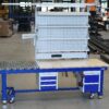 Stufenlos höhenverstellbare Werkbank, Arbeitstisch mit Rückwand